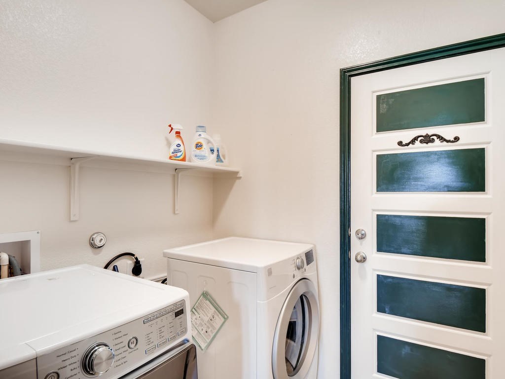 1301 Autumn Sage Way Pflugerville, TX 78660 - Photo 7 of 28 a utility room with dryer and washer