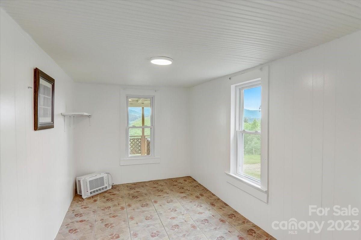 214 Plank Road Canton, NC 28716 - Photo 17 of 27 a view of an empty room and window