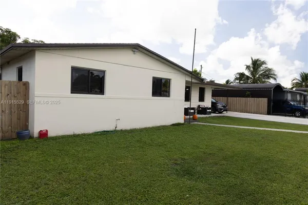a front view of house with yard