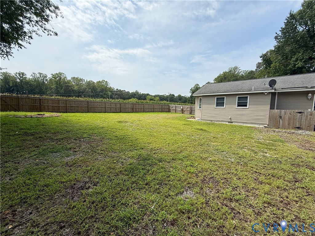 136 Twiggs Ferry Road Dutton, VA 23050 - Photo 36 of 38 Expansive backyard featuring a wood privacy fence