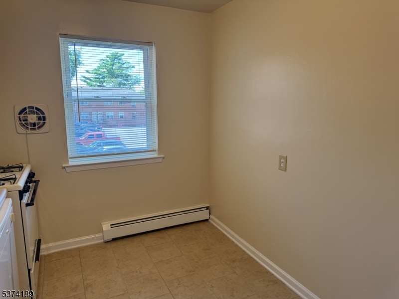 63 Traphagen Road, Unit B Wayne, NJ 07470 - Photo 16 of 18 a view of a room with a window