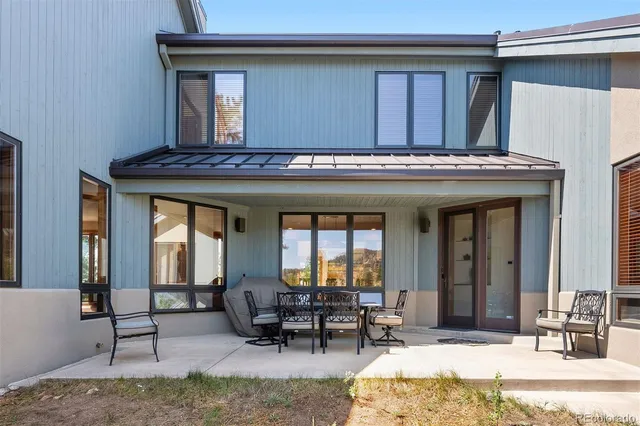 a view of a livingroom with furniture and window