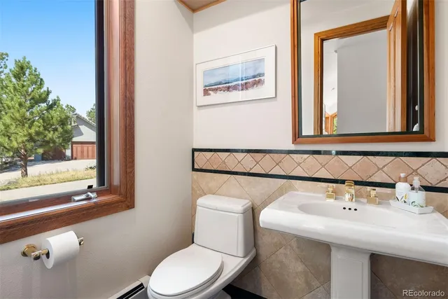 a bathroom with a sink and a toilet