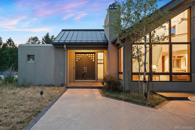 a view of a house with porch and wooden floor