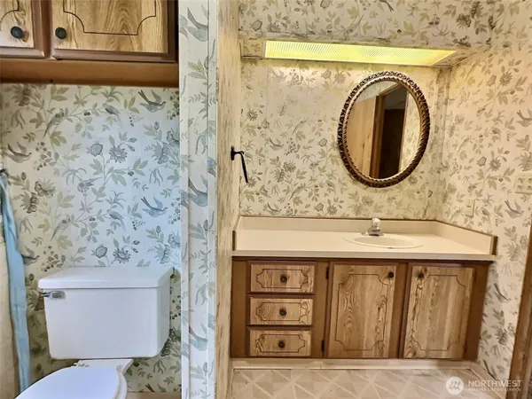 a bathroom with a tub and shower