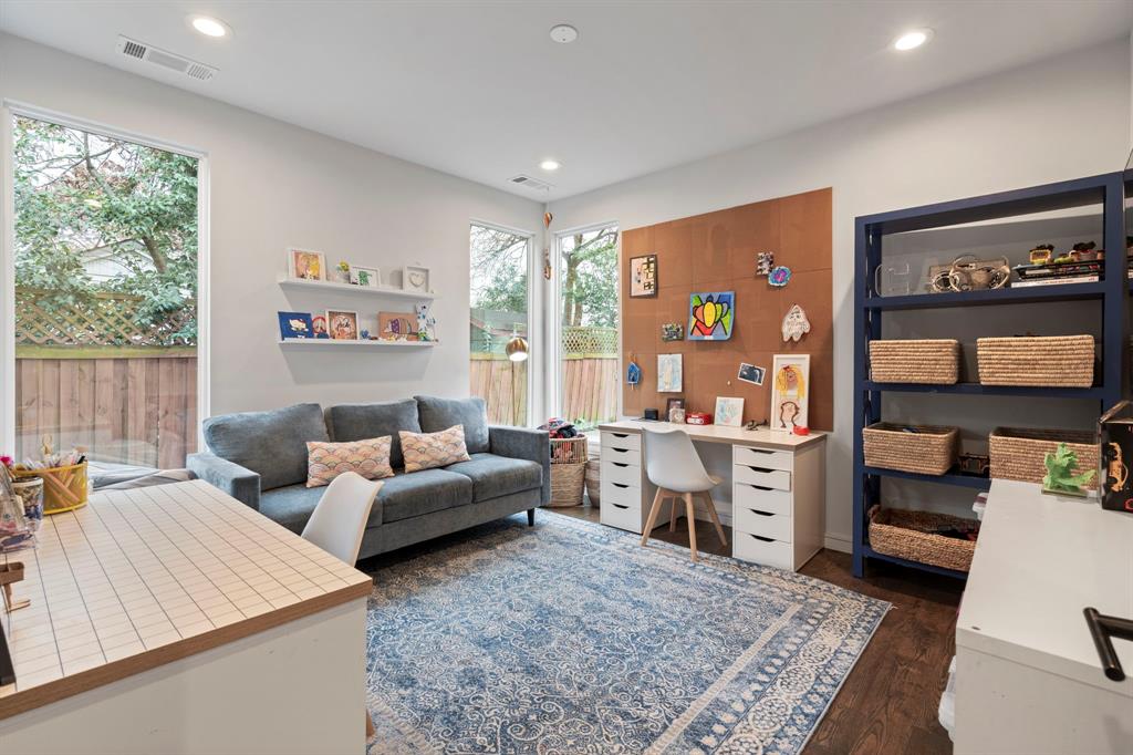 6605 Robin Road Dallas, TX 75209 - Photo 23 of 28 a living room with furniture and a large window