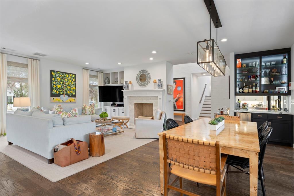 6605 Robin Road Dallas, TX 75209 - Photo 6 of 28 a living room with fireplace furniture and a flat screen tv