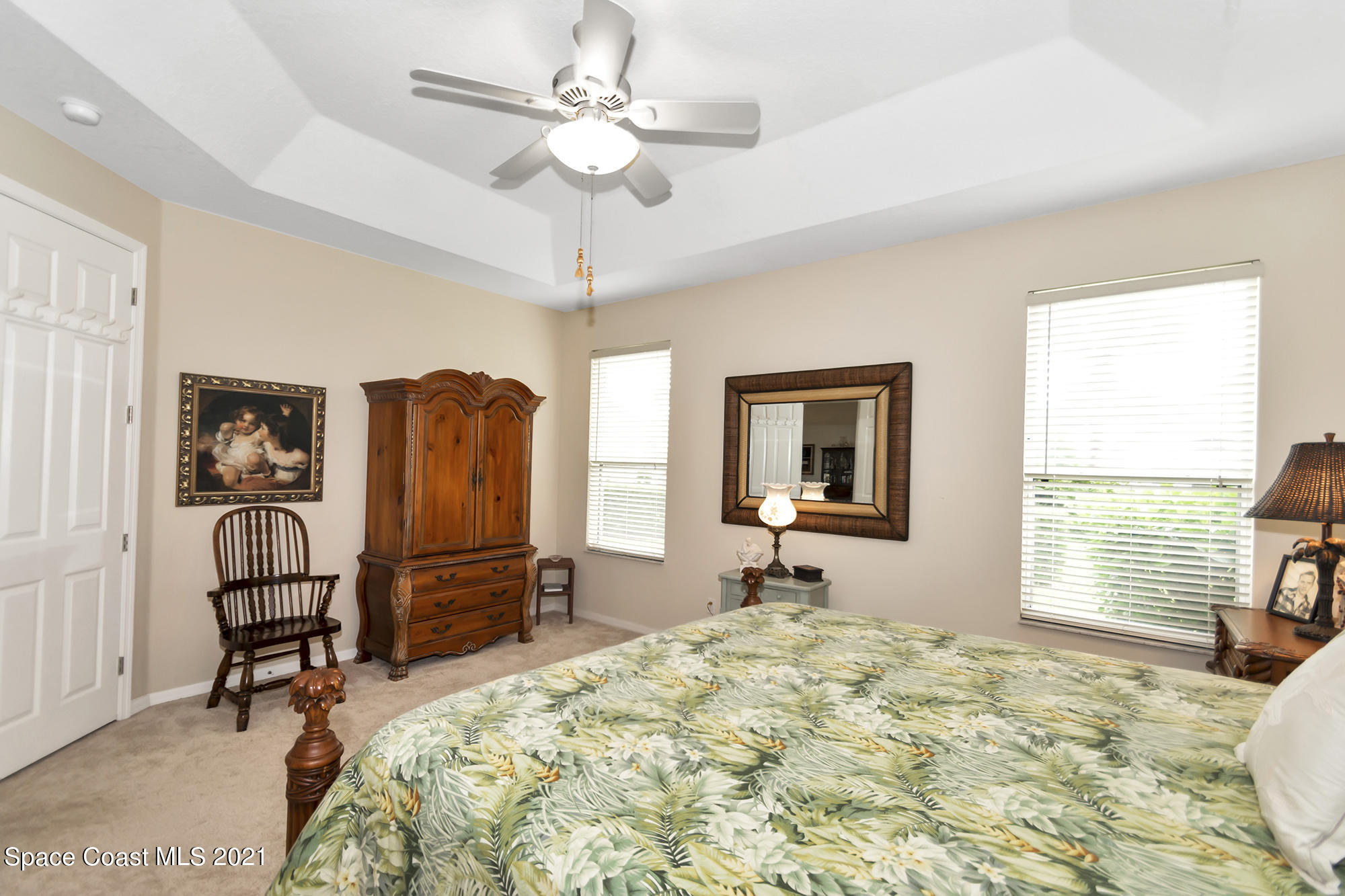 569 Renaissance Avenue Melbourne, FL 32940 - Photo 16 of 34 a bedroom with furniture and a window