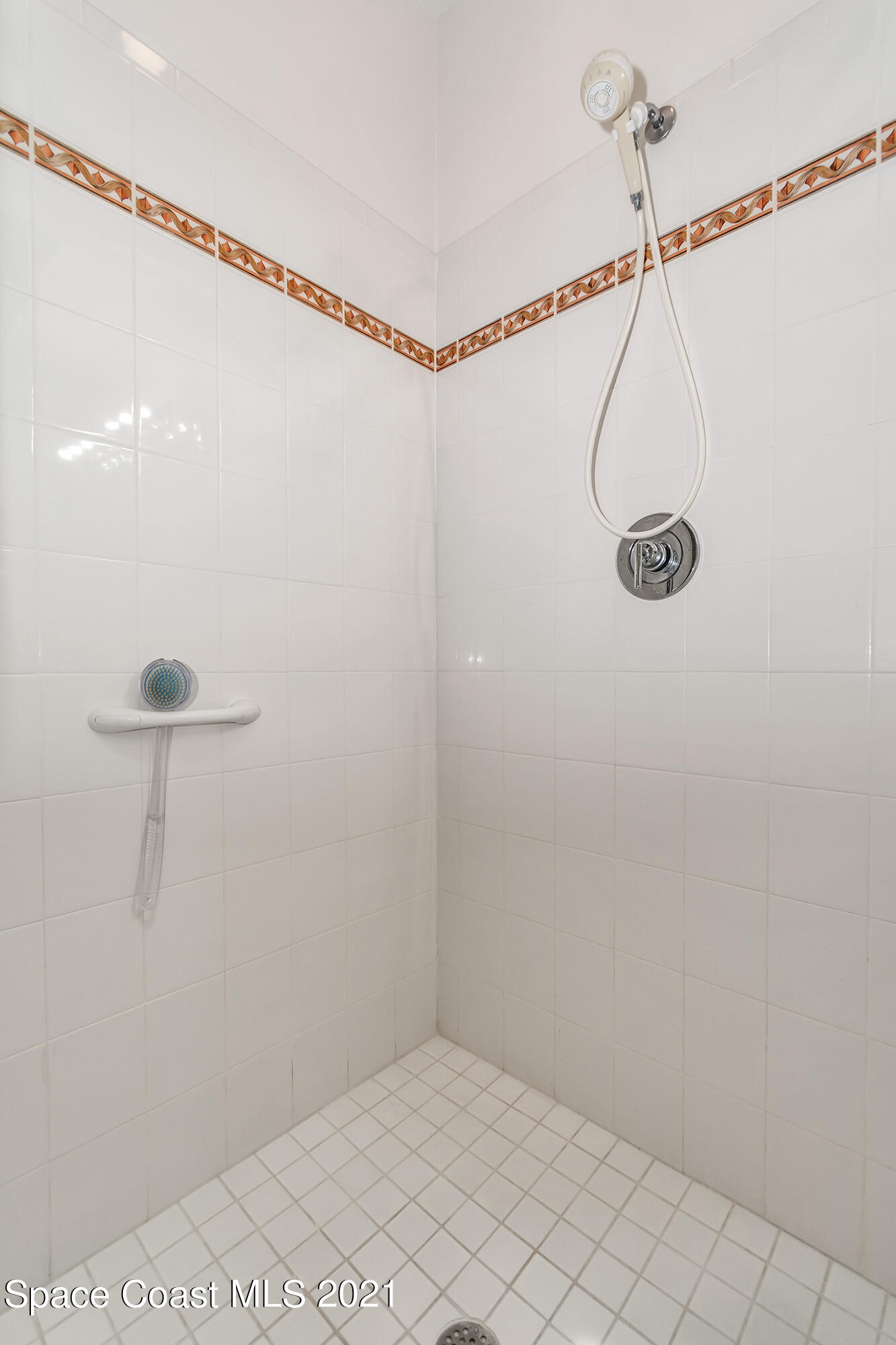 569 Renaissance Avenue Melbourne, FL 32940 - Photo 20 of 34 a view of a room with racks on the wall