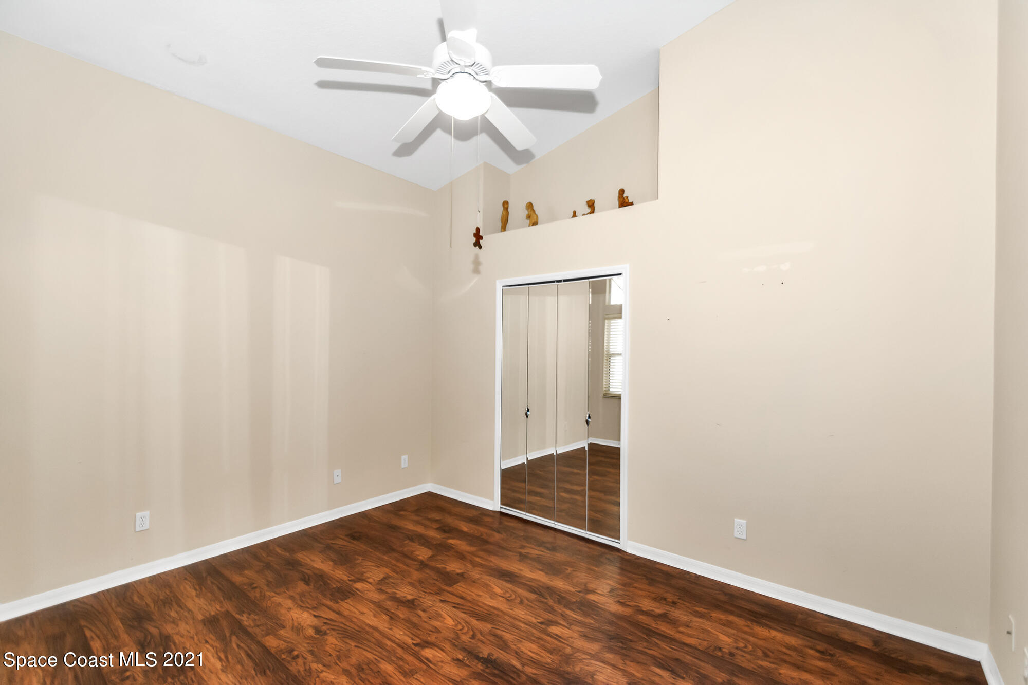 569 Renaissance Avenue Melbourne, FL 32940 - Photo 22 of 34 a view of an empty room with a window