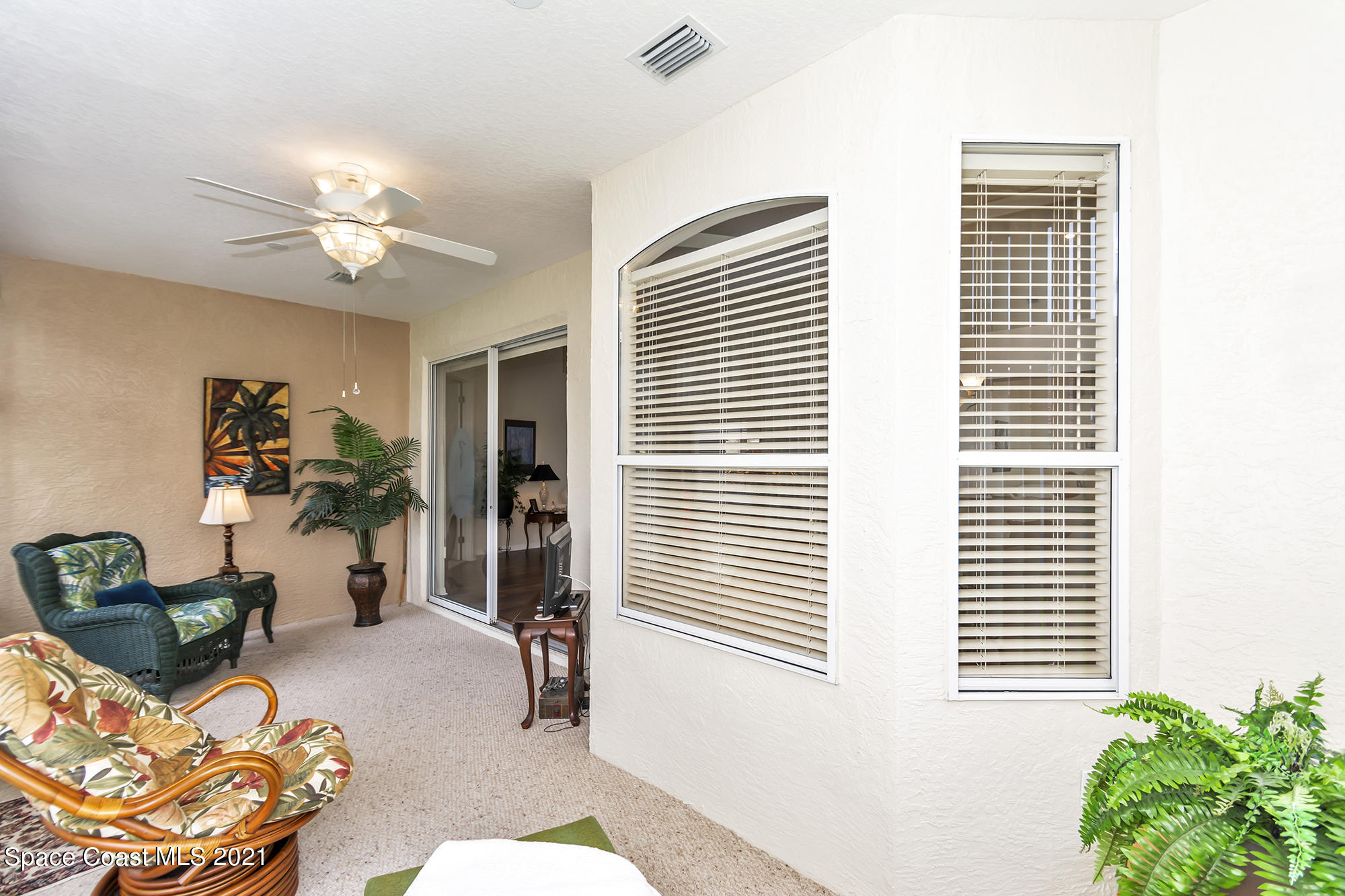 569 Renaissance Avenue Melbourne, FL 32940 - Photo 27 of 34 a living room with furniture and a window