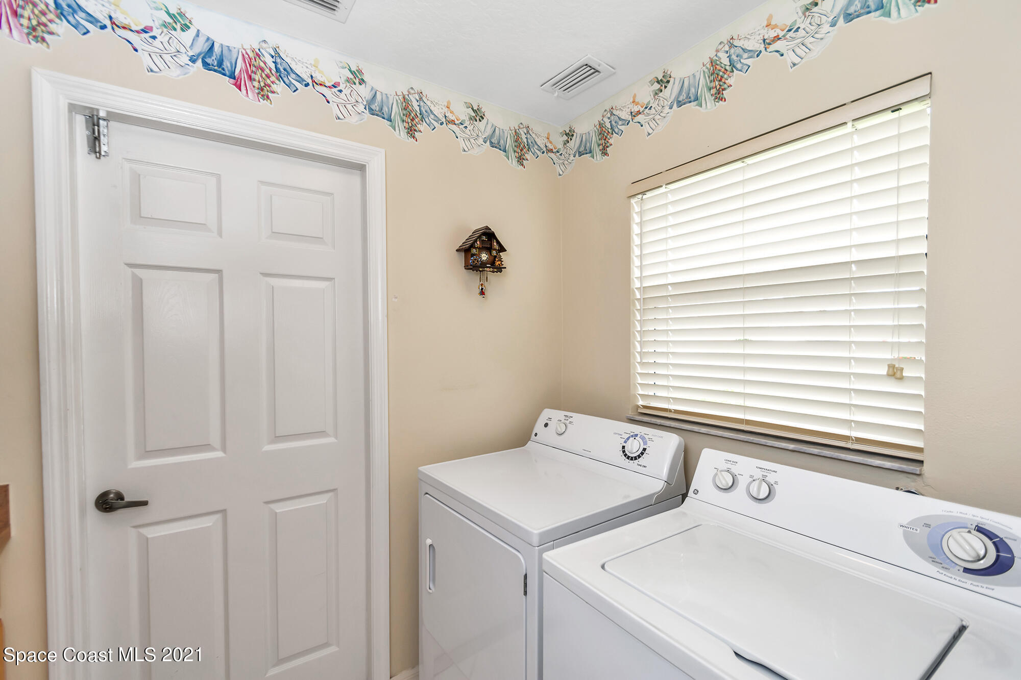 569 Renaissance Avenue Melbourne, FL 32940 - Photo 29 of 34 a view of washer and dryer