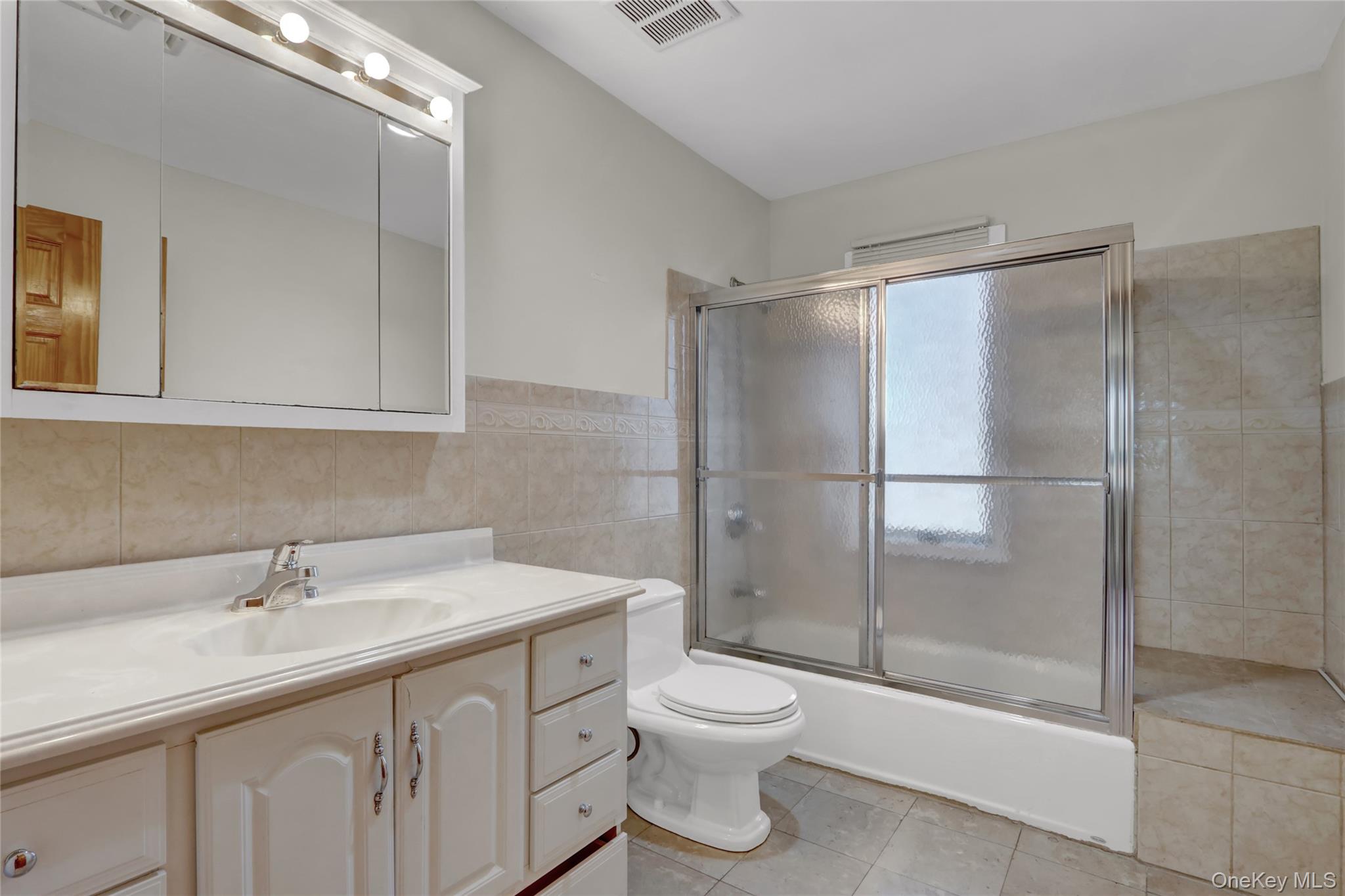 600 Plainview Road Plainview, NY 11803 - Photo 24 of 41 a bathroom with a sink toilet and shower