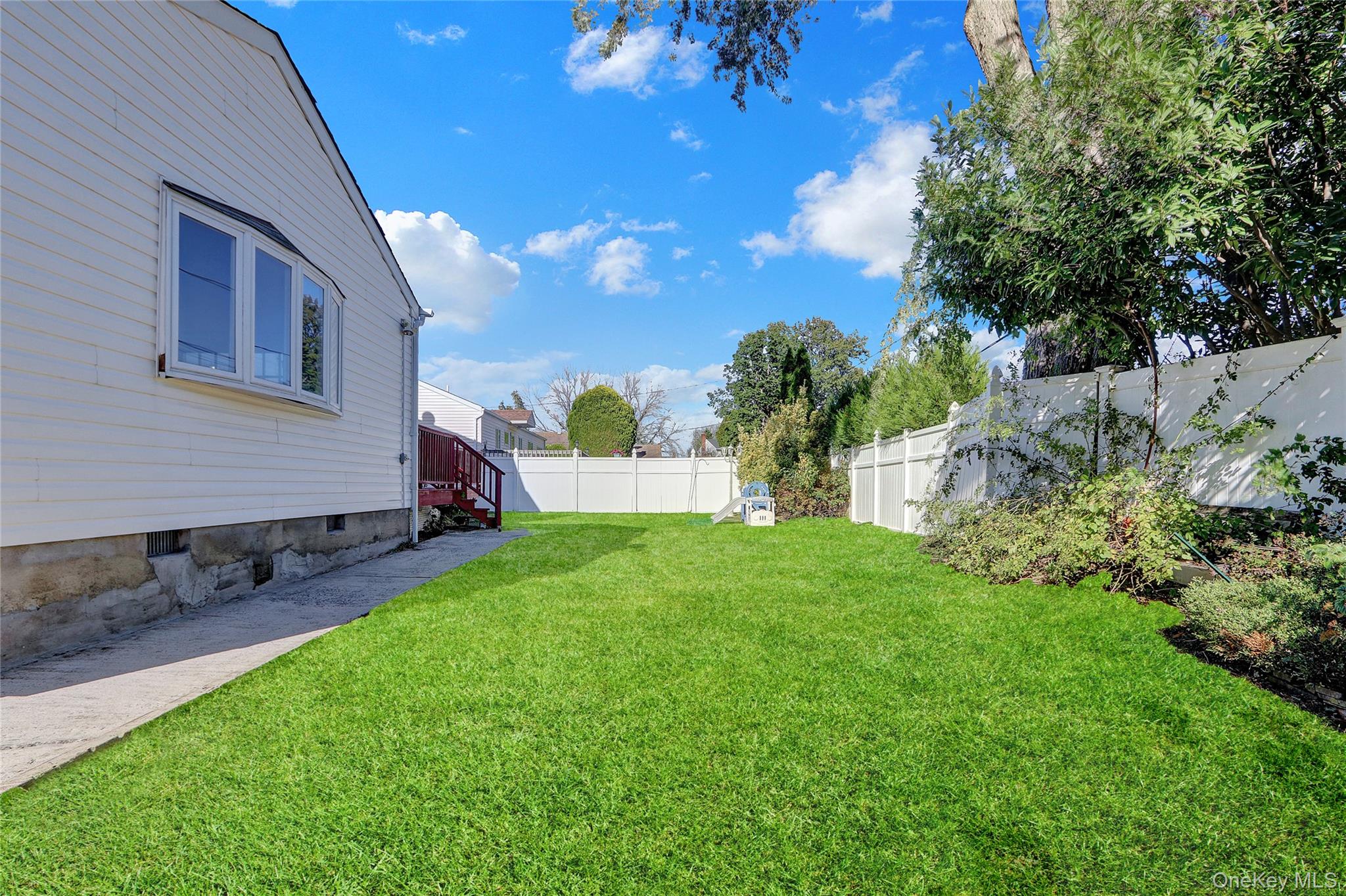 600 Plainview Road Plainview, NY 11803 - Photo 38 of 41 a view of yard with green space