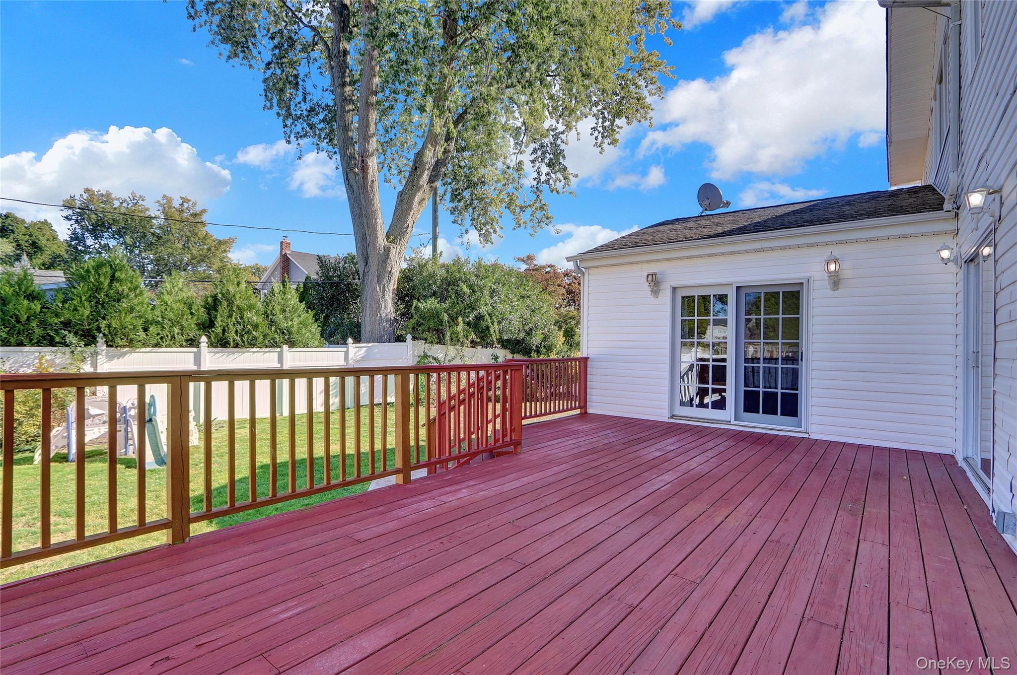 600 Plainview Road Plainview, NY 11803 - Photo 39 of 41 a view of a house with a deck