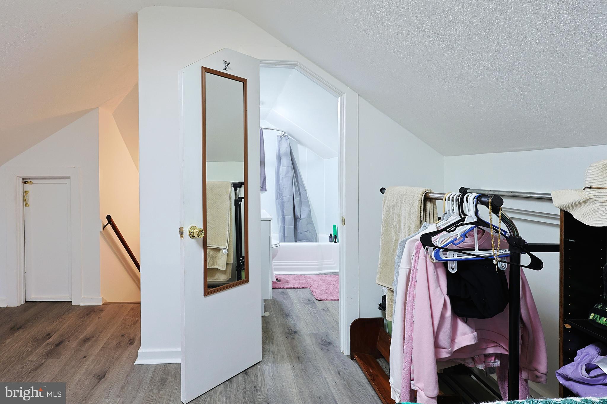 11305 Creek Road Southeast Cumberland, MD 21502 - Photo 25 of 47 a view of walk in closet with clothes and shoes