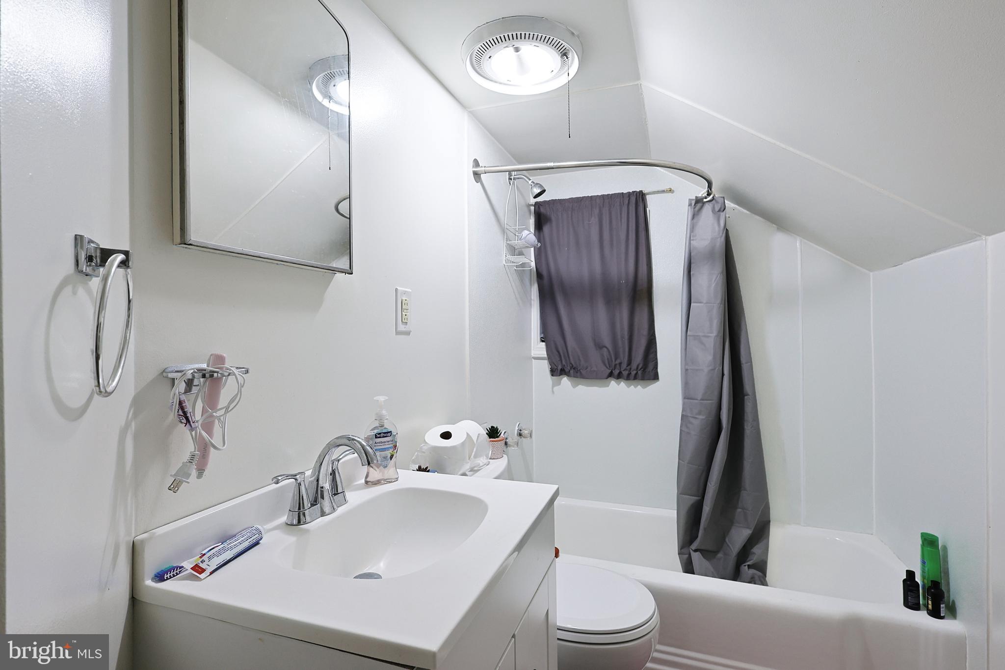 11305 Creek Road Southeast Cumberland, MD 21502 - Photo 26 of 47 a bathroom with a sink toilet and shower
