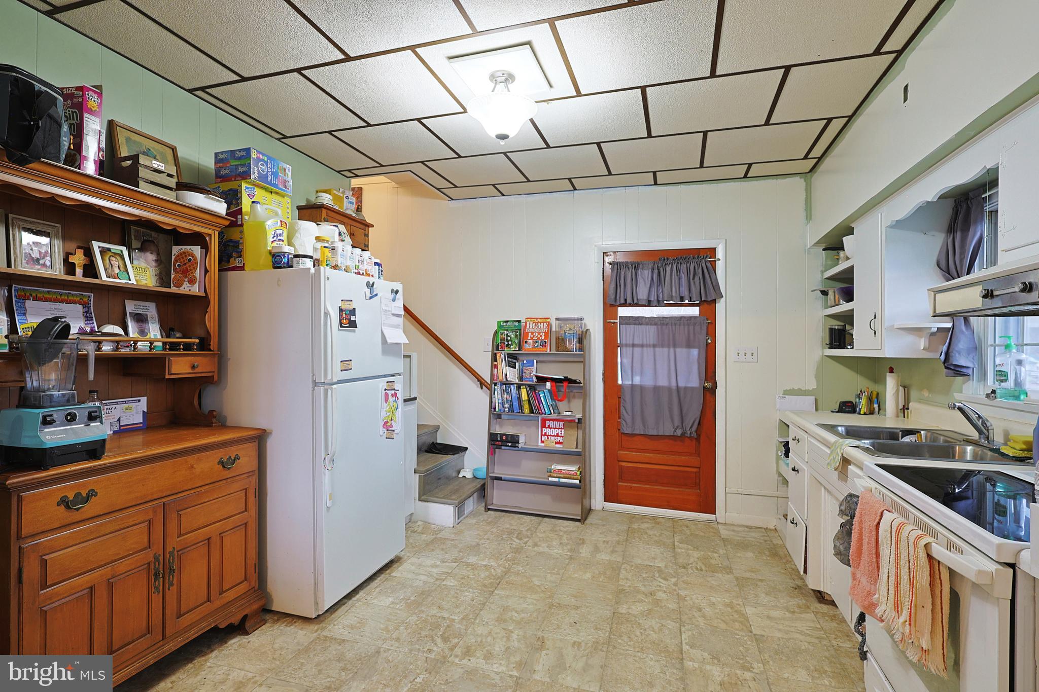 11305 Creek Road Southeast Cumberland, MD 21502 - Photo 6 of 47 a storage room with cabinets