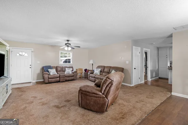 a kitchen with a refrigerator sink and stove