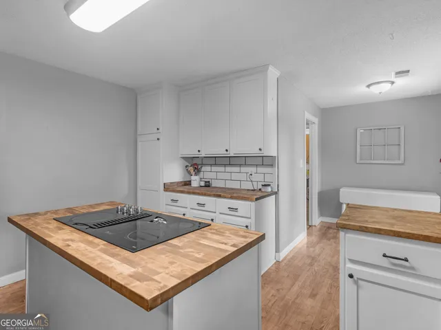 a bedroom with a bed and a table