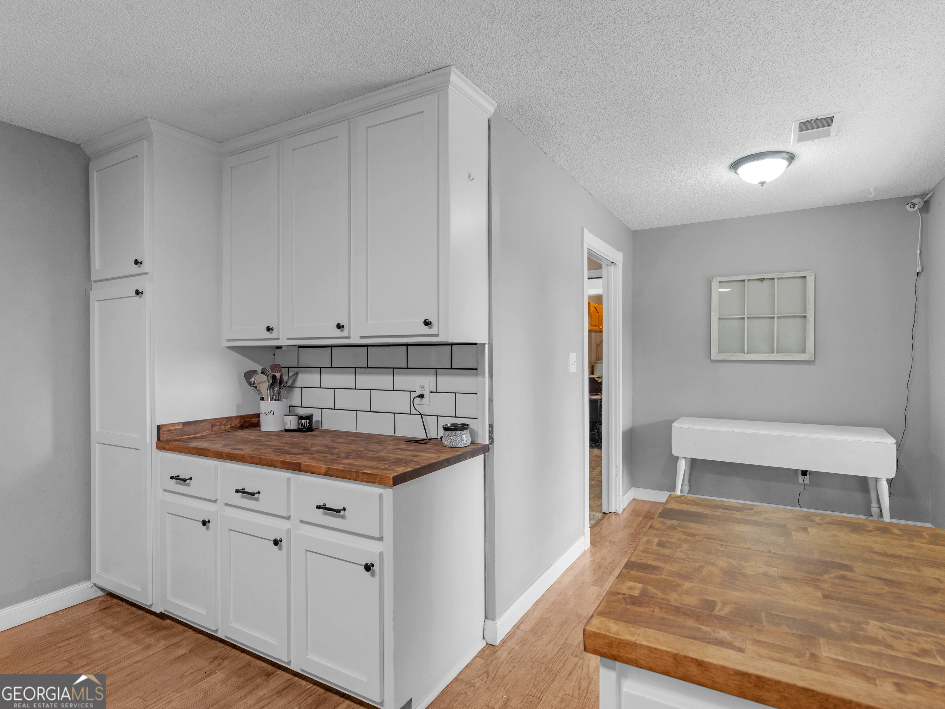 4939 Highway 19 Zebulon, GA 30295 - Photo 21 of 70 a kitchen with a sink and cabinets
