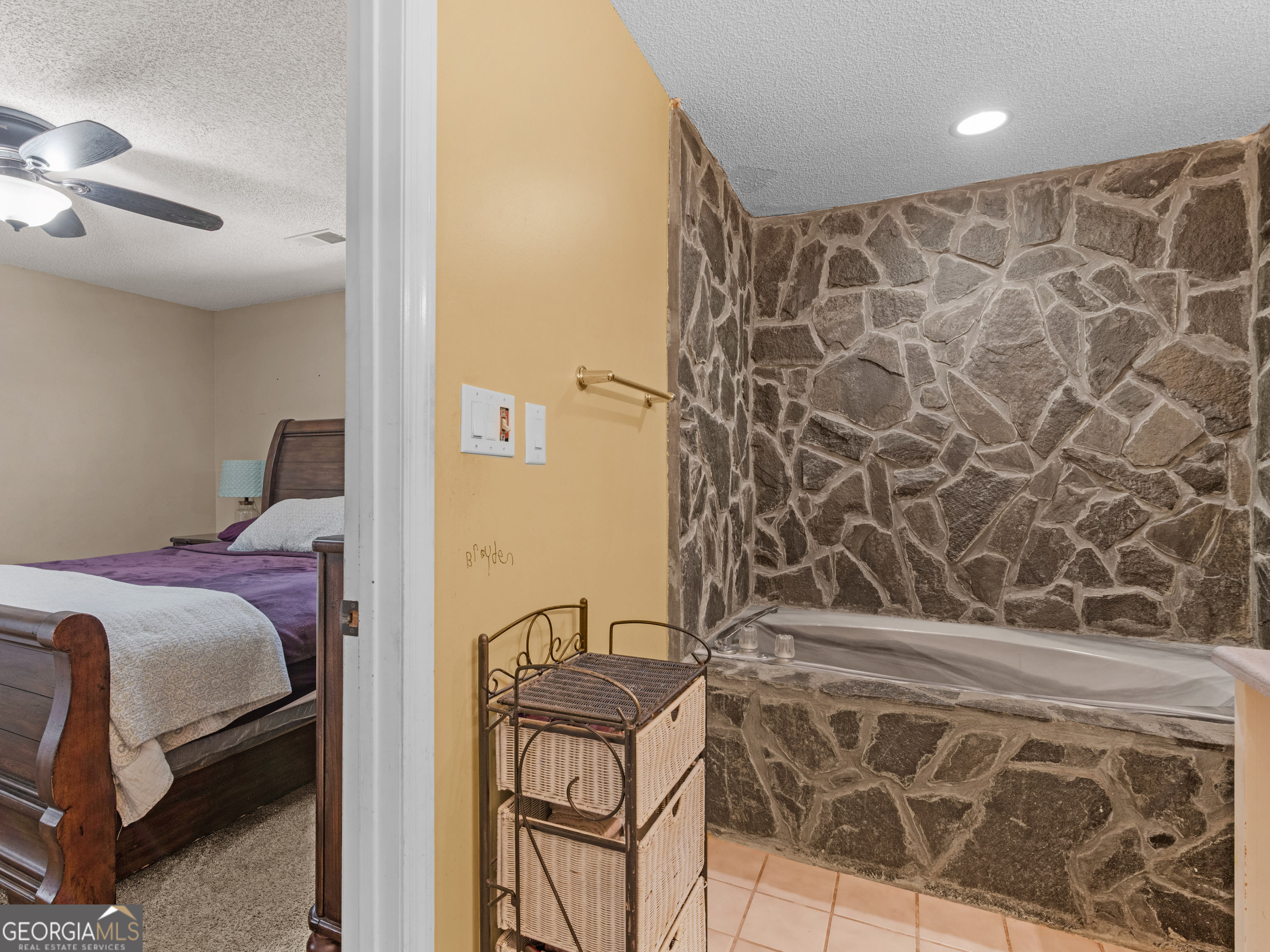 4939 Highway 19 Zebulon, GA 30295 - Photo 28 of 70 a bedroom with a bed and a shower