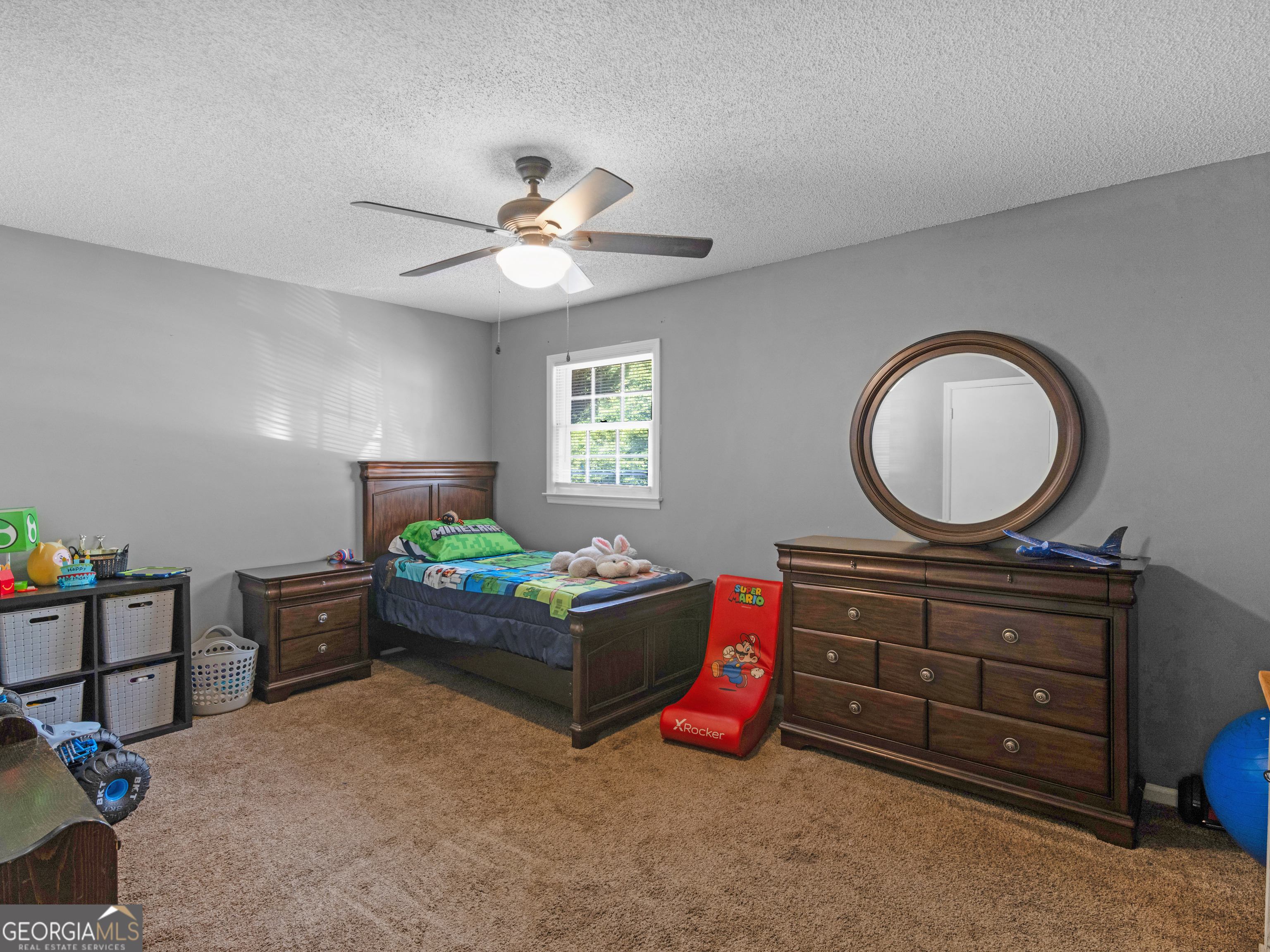 4939 Highway 19 Zebulon, GA 30295 - Photo 34 of 70 a living room with furniture and a mirror