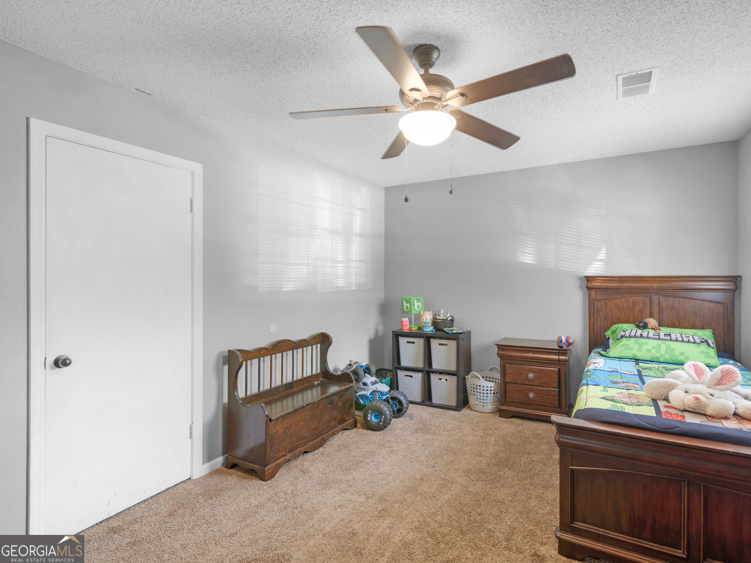 4939 Highway 19 Zebulon, GA 30295 - Photo 36 of 70 a bed room with furniture and a window