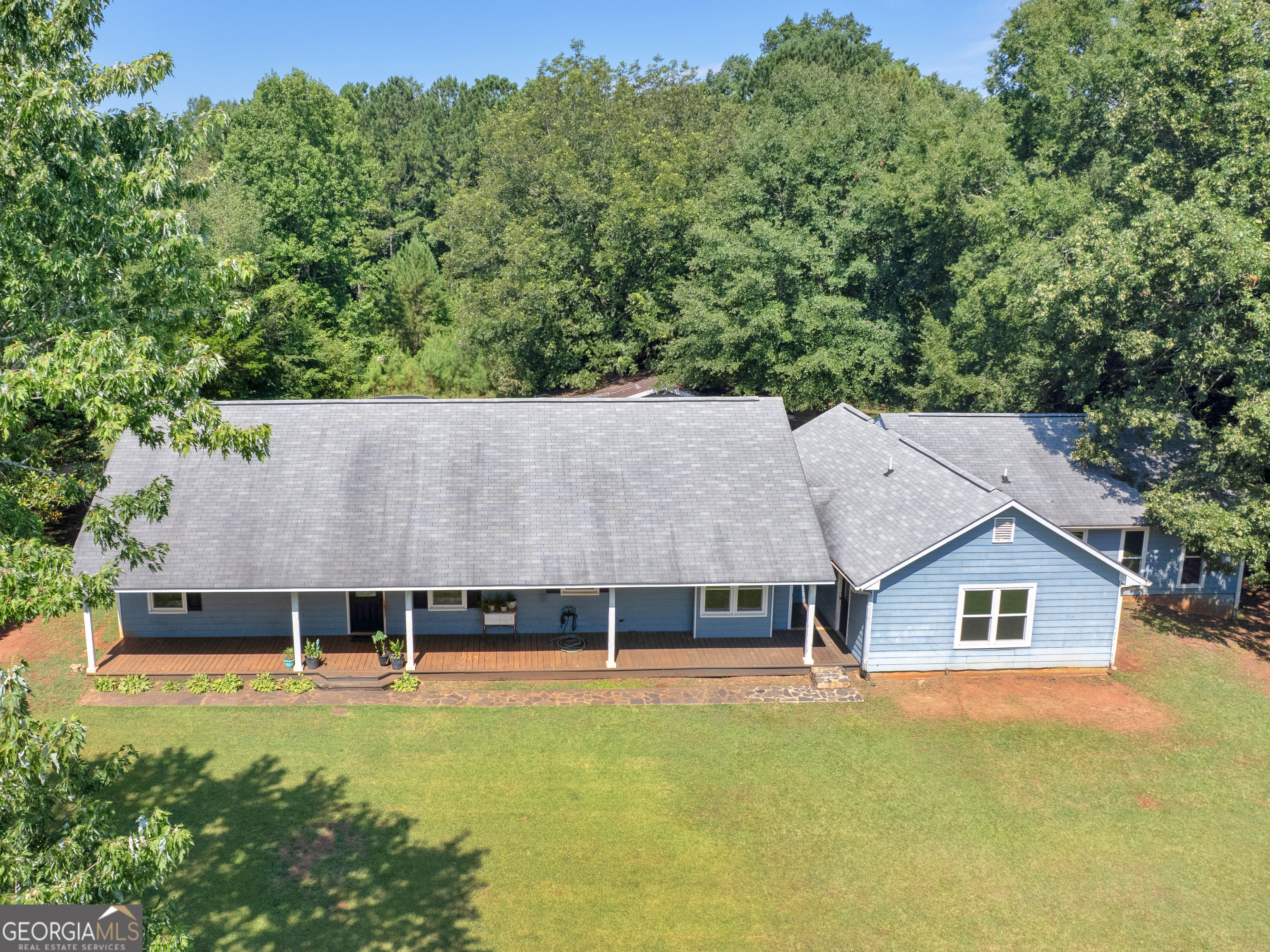 4939 Highway 19 Zebulon, GA 30295 - Photo 5 of 70 an aerial view of a house with swimming pool and a yard