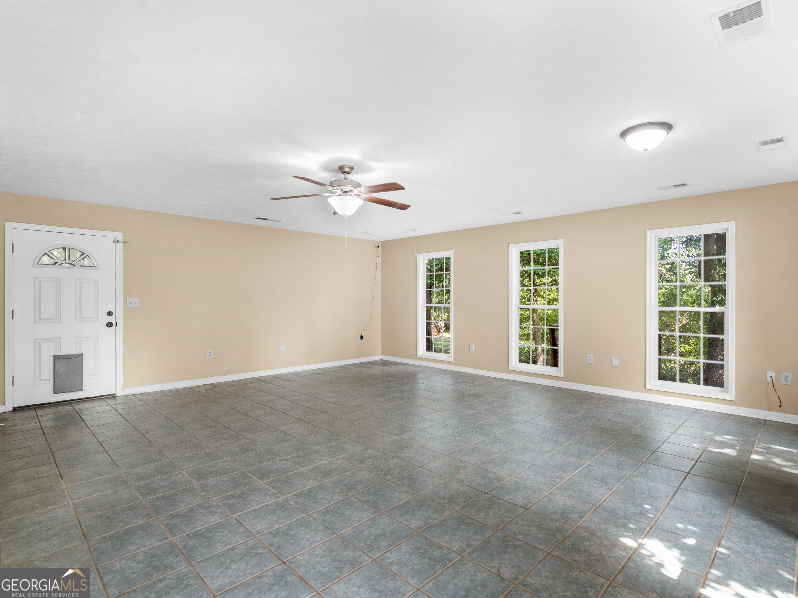 4939 Highway 19 Zebulon, GA 30295 - Photo 52 of 70 a view of an empty room with a window