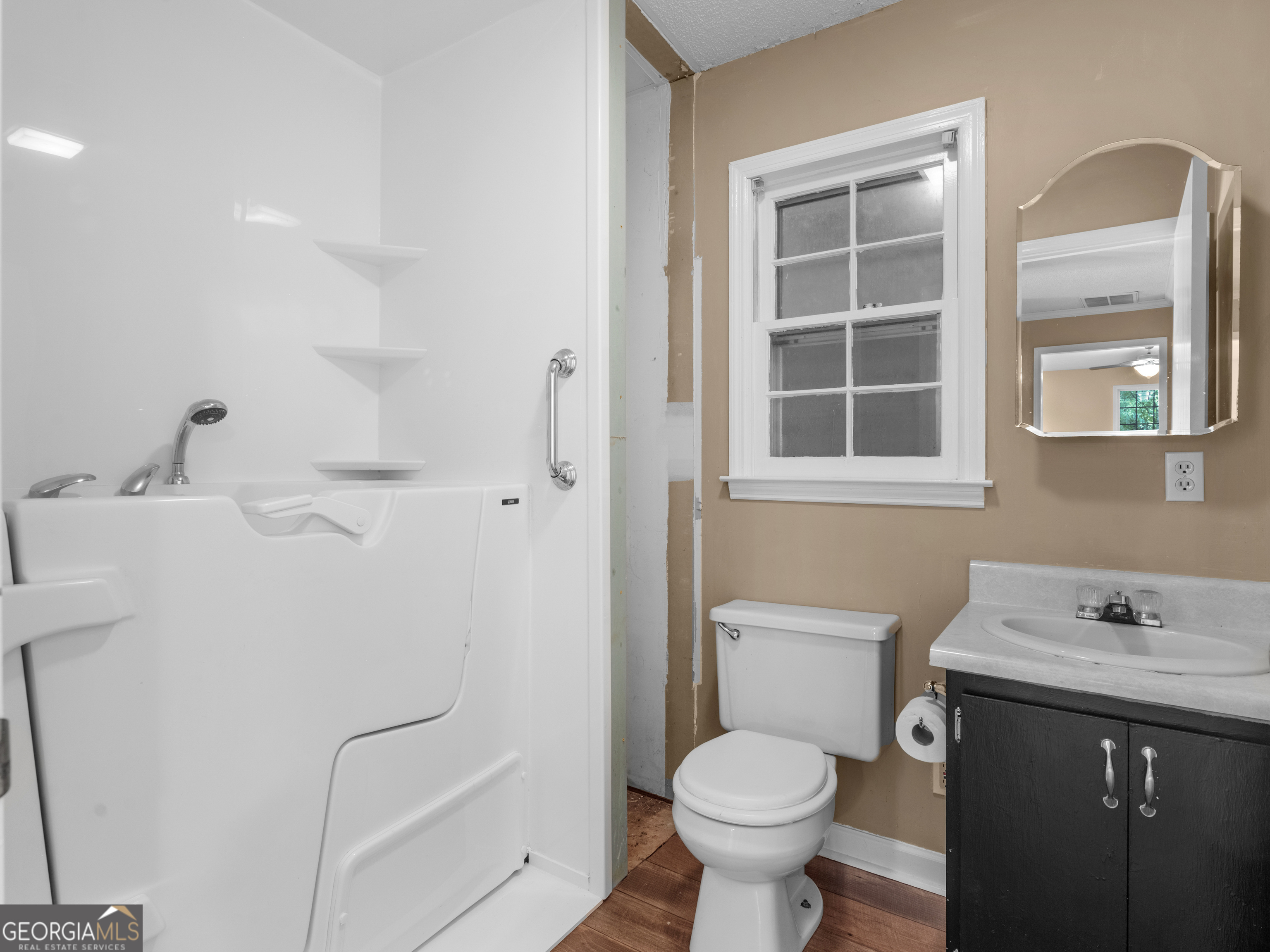 4939 Highway 19 Zebulon, GA 30295 - Photo 57 of 70 a bathroom with a sink toilet and shower