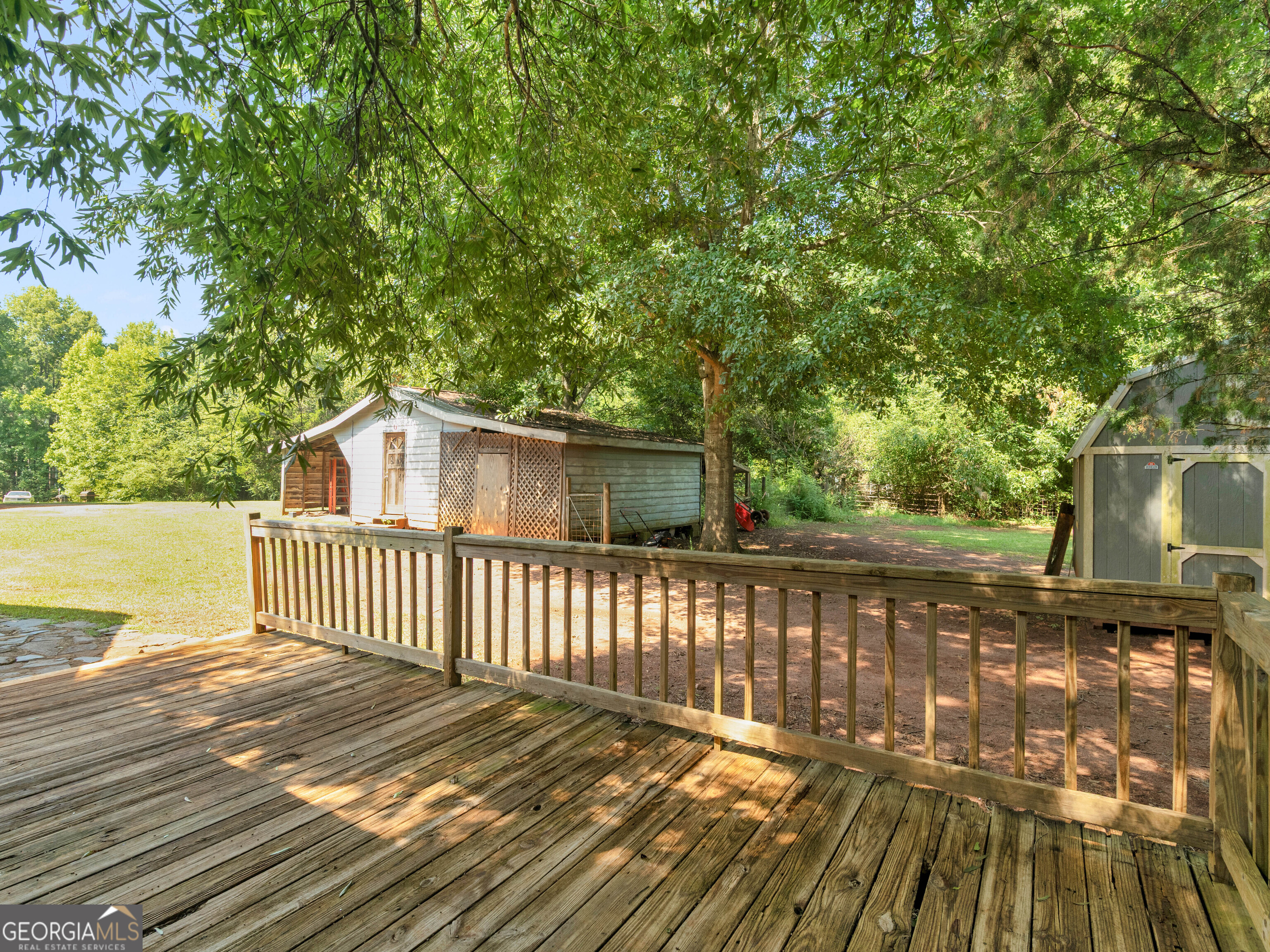 4939 Highway 19 Zebulon, GA 30295 - Photo 61 of 70 a view of a wooden roof deck