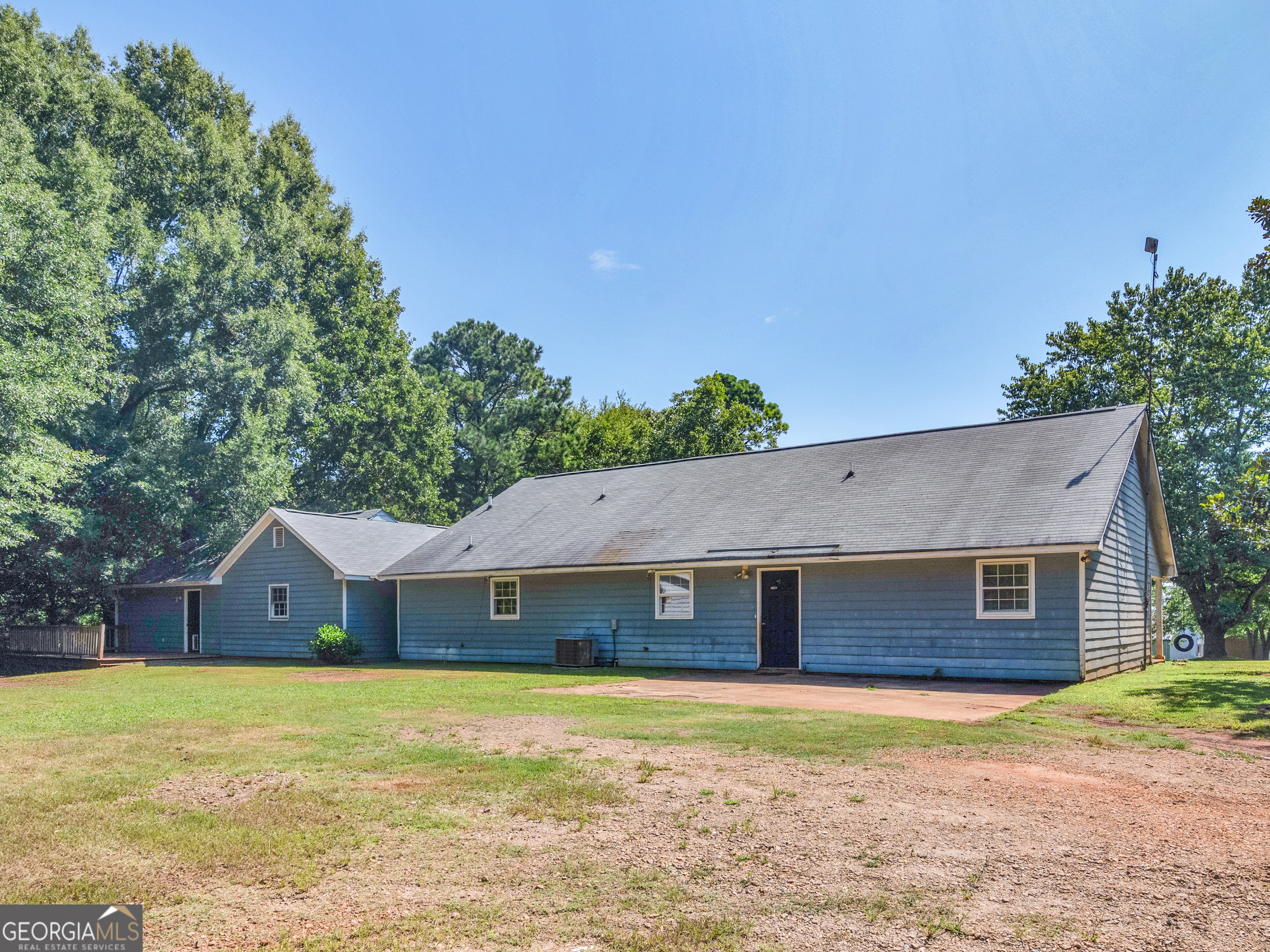 4939 Highway 19 Zebulon, GA 30295 - Photo 65 of 70 a front view of a house with a yard