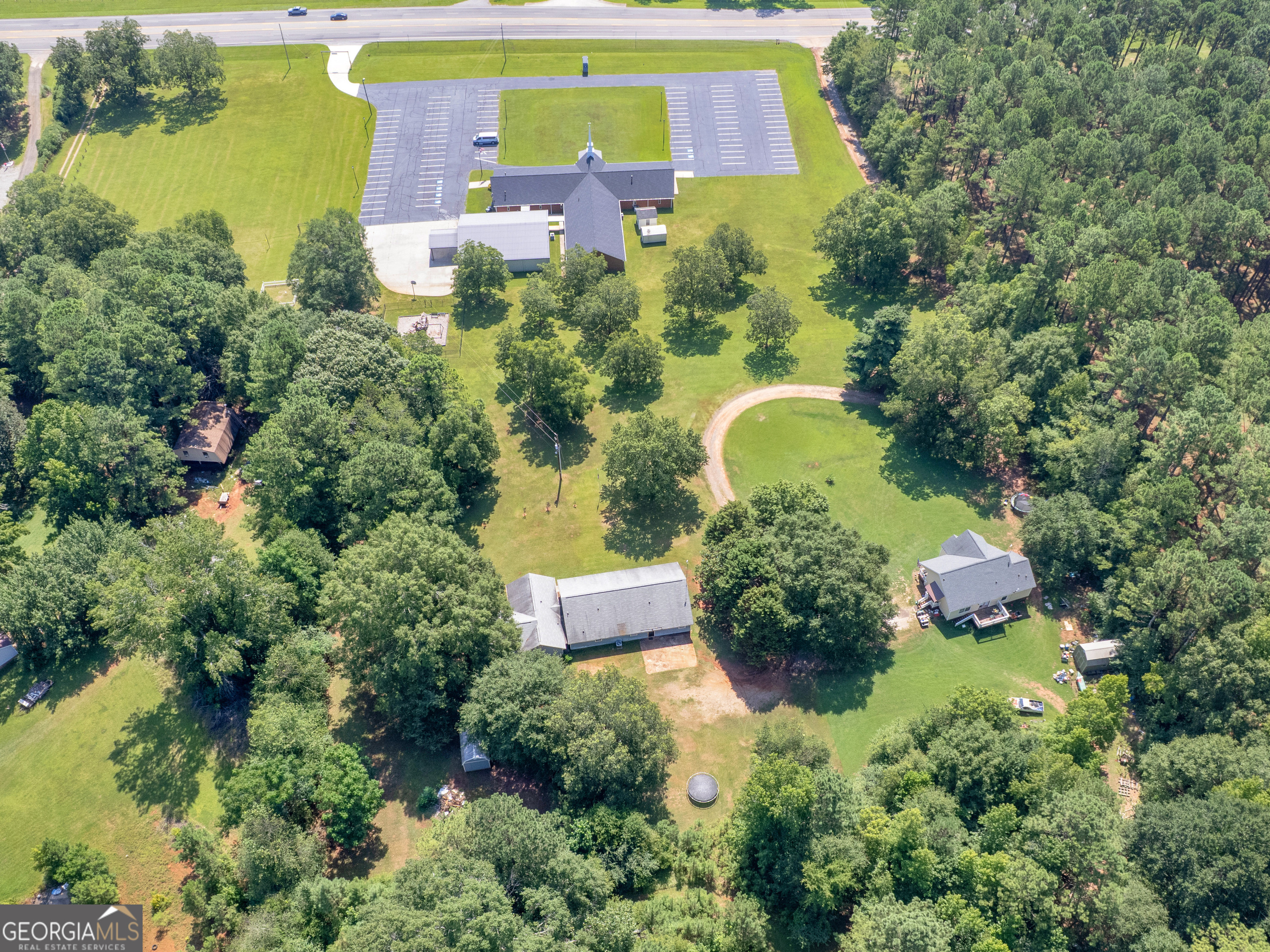 4939 Highway 19 Zebulon, GA 30295 - Photo 70 of 70 an aerial view of a house with swimming pool outdoor seating and yard