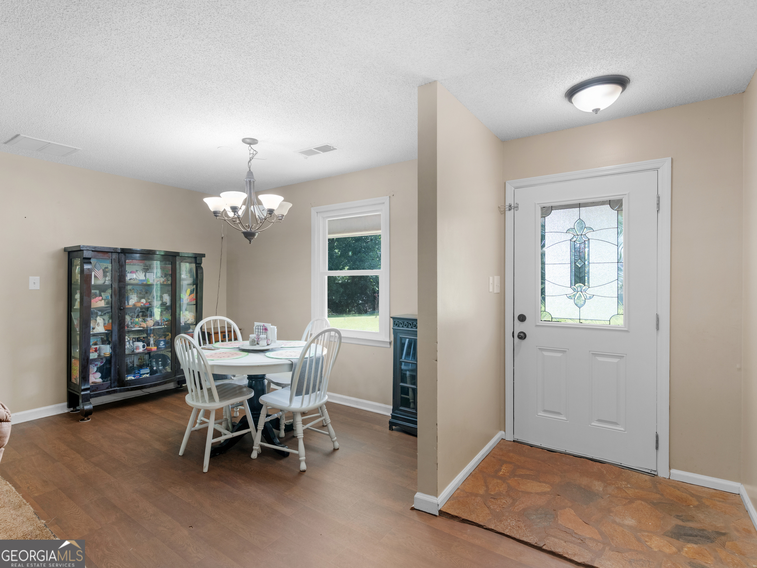 4939 Highway 19 Zebulon, GA 30295 - Photo 8 of 70 a dining room with furniture and window