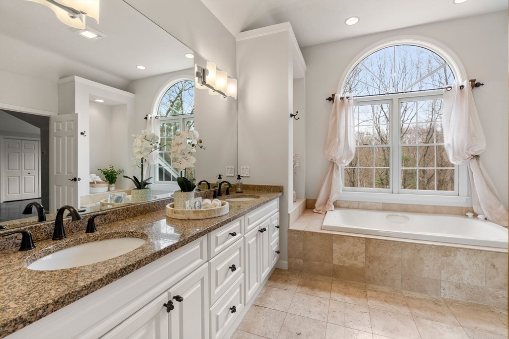 4 Ridge Road Framingham, MA 01701 - Photo 20 of 41 a spacious bathroom with a sink double vanity and a mirror