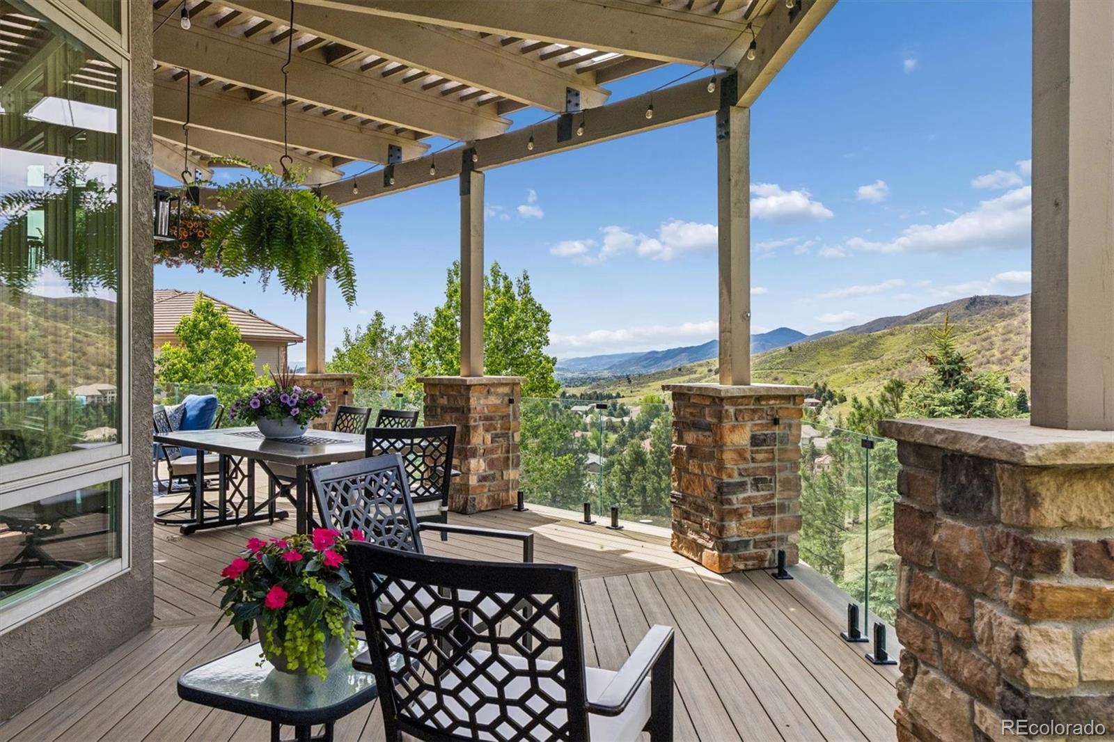 16422 Rocky Point Lane Morrison, CO 80465 - Photo 11 of 50 a view of balcony with a potted plant