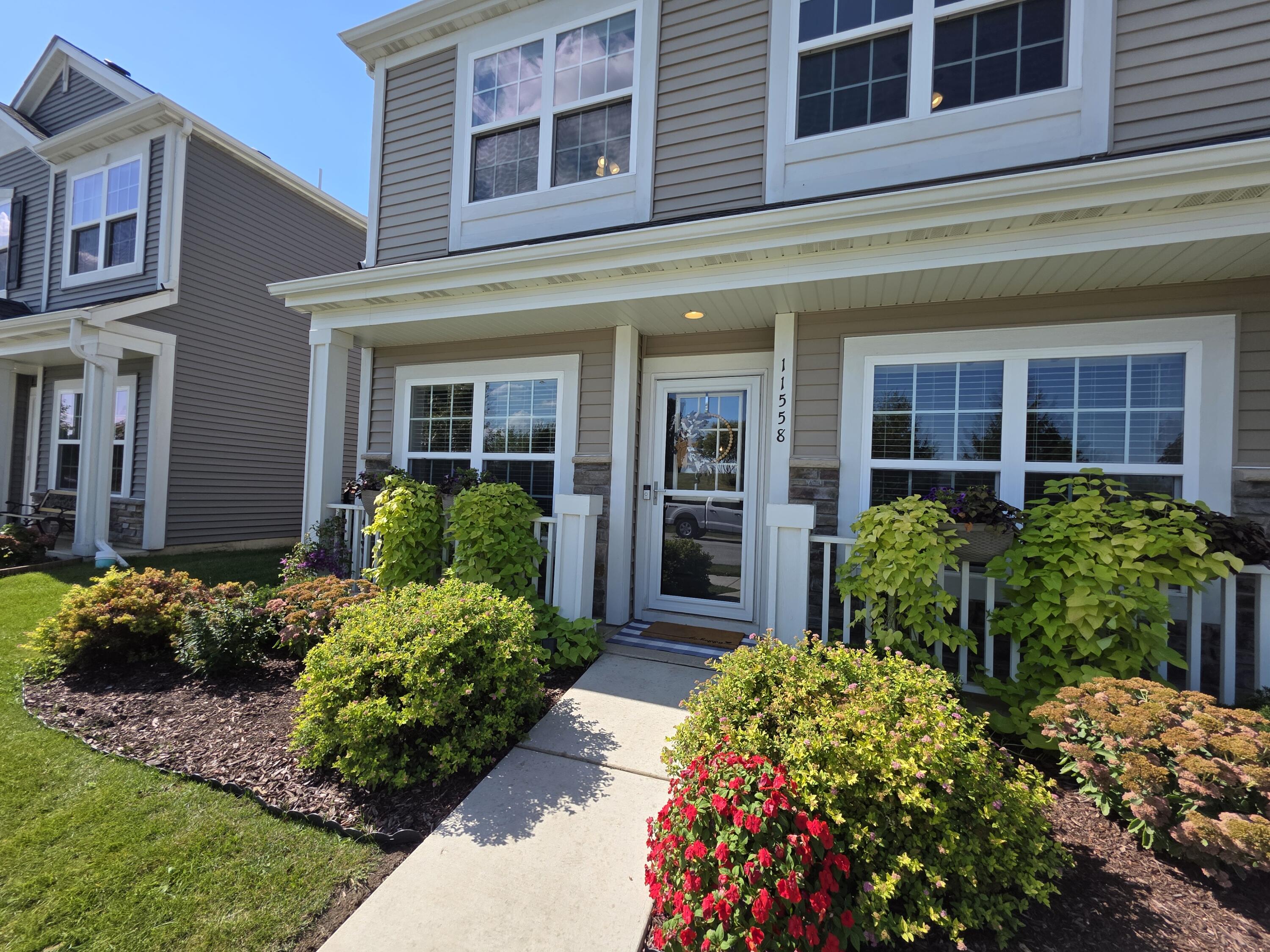 11558 Kentucky Street Crown Point, IN 46307 - Photo 2 of 39 front view of a building