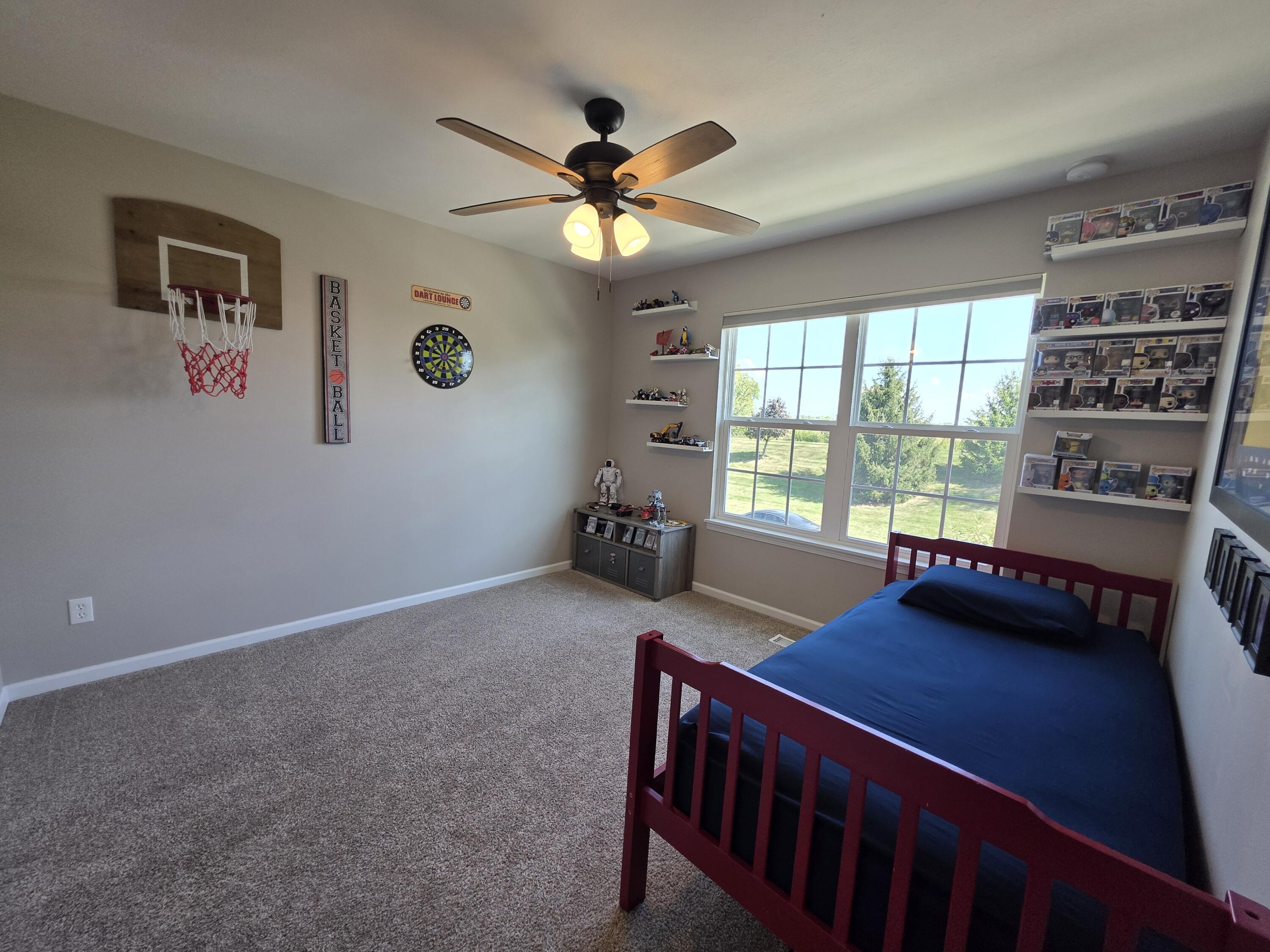 11558 Kentucky Street Crown Point, IN 46307 - Photo 28 of 39 a view of a livingroom with furniture and window