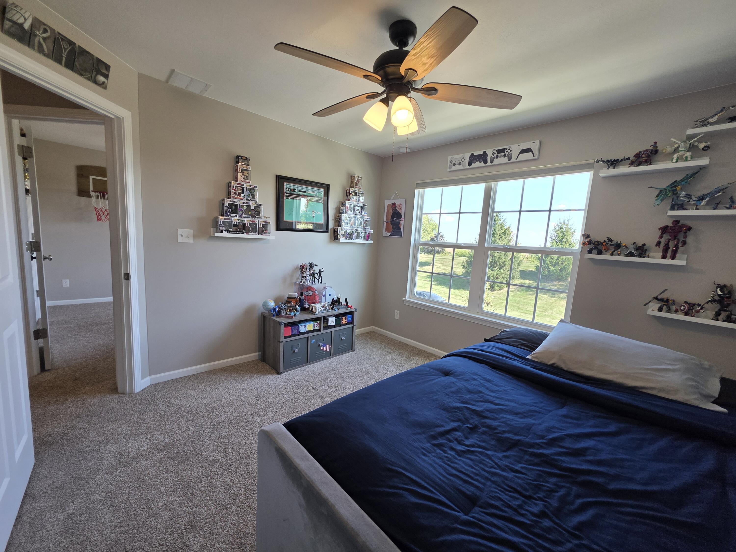 11558 Kentucky Street Crown Point, IN 46307 - Photo 30 of 39 a living room with furniture and a large window