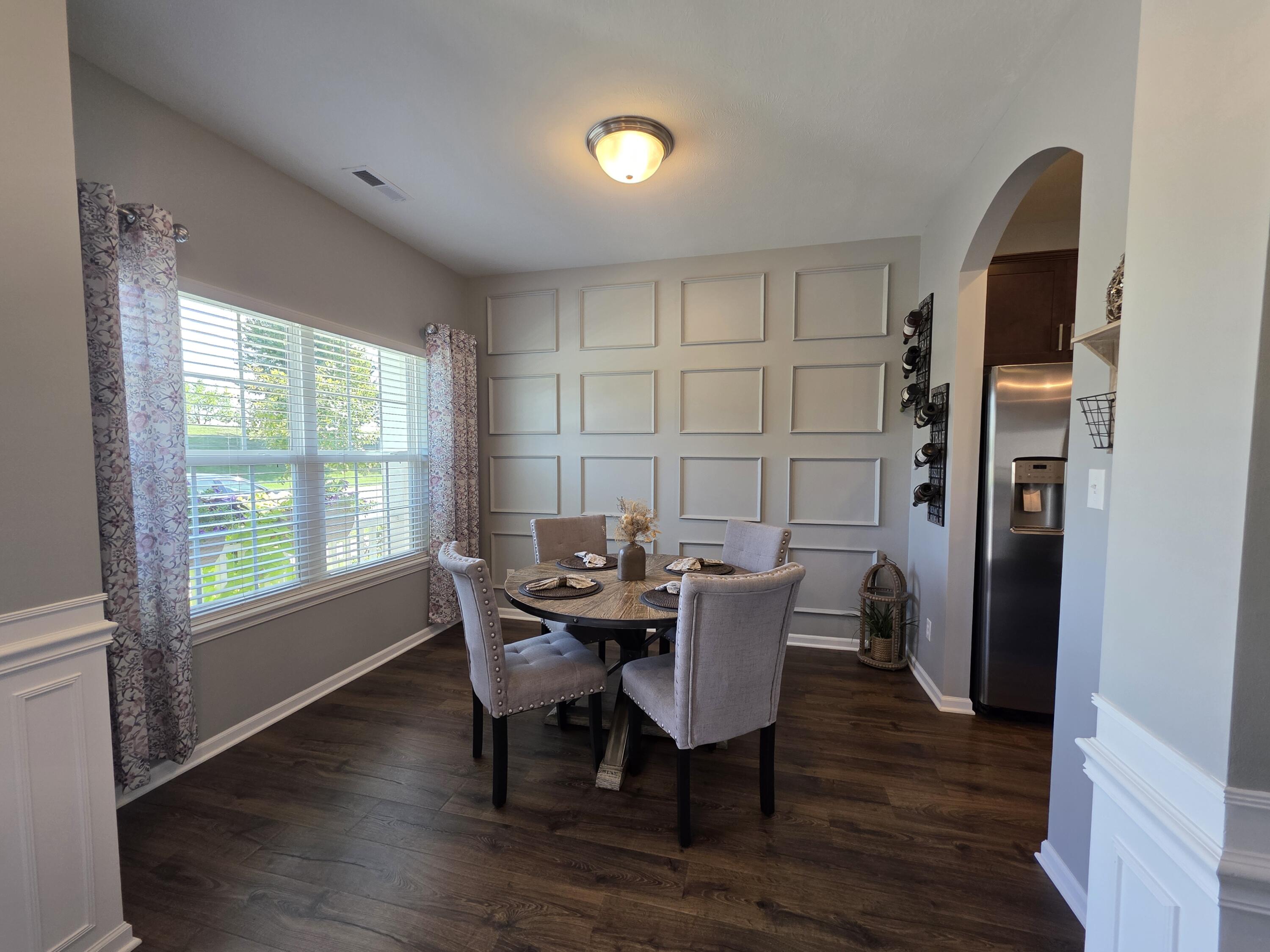 11558 Kentucky Street Crown Point, IN 46307 - Photo 6 of 39 a view of a dining room with furniture and window