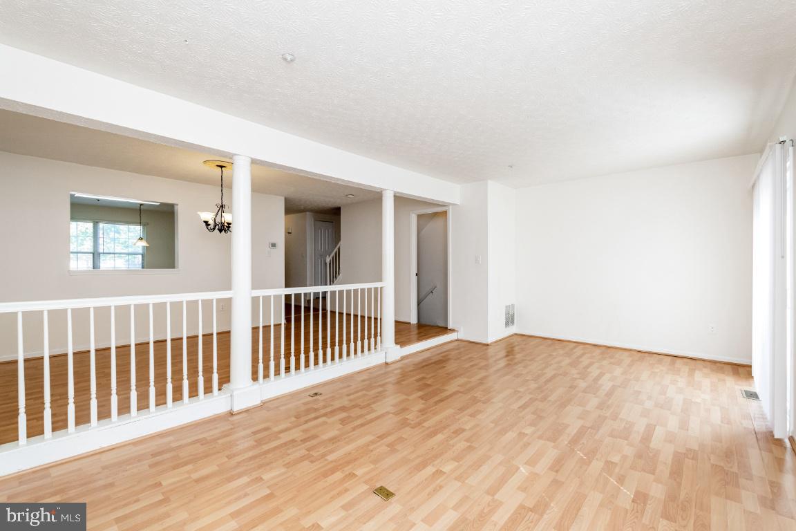 9319 Ridings Way Laurel, MD 20723 - Photo 19 of 44 Living room view in to dining room