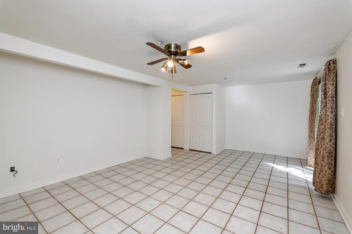 9319 Ridings Way Laurel, MD 20723 - Photo 36 of 44 Lower level family room