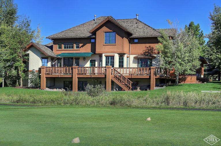 35 Buckboard Road Edwards, CO 81632 - Photo 18 of 21 a front view of a house with a garden