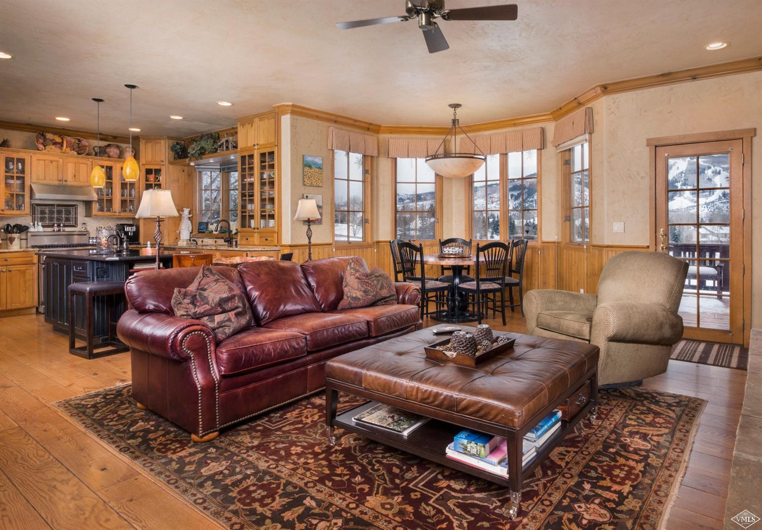 35 Buckboard Road Edwards, CO 81632 - Photo 2 of 21 a living room with furniture and a rug