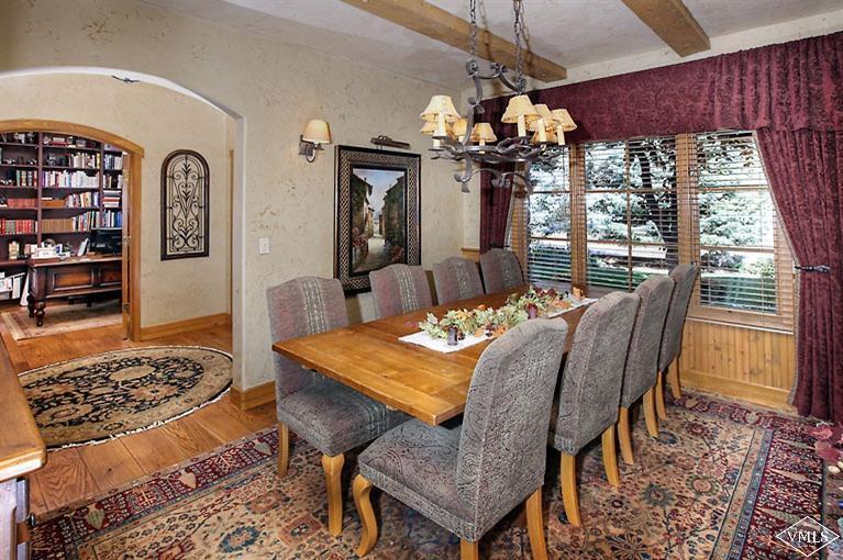 35 Buckboard Road Edwards, CO 81632 - Photo 6 of 21 a view of a dining room with furniture window and wooden floor