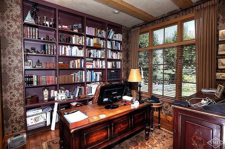 35 Buckboard Road Edwards, CO 81632 - Photo 8 of 21 a room with furniture and a book shelf