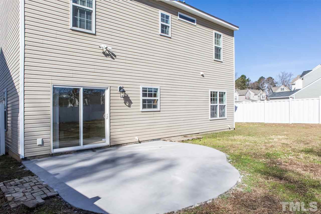 2905 Smooth Stone Trail Raleigh, NC 27610 - Photo 23 of 29 a view of backyard of house