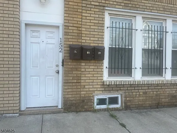 a brick house with a door