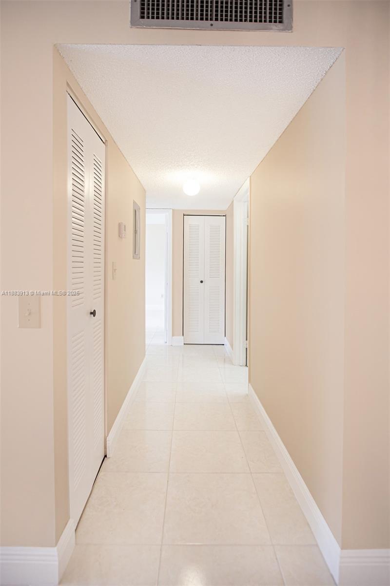 9711 West McNab Road, Unit 203 Tamarac, FL 33321 - Photo 11 of 37 a view of an empty room